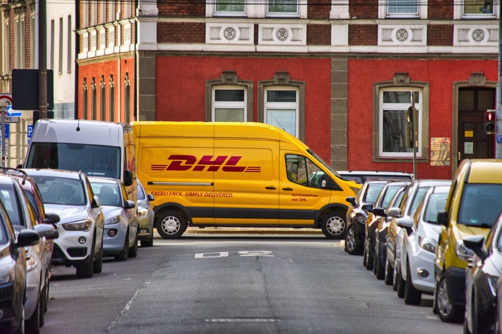 dhl, delivery, cars-5739205.jpg